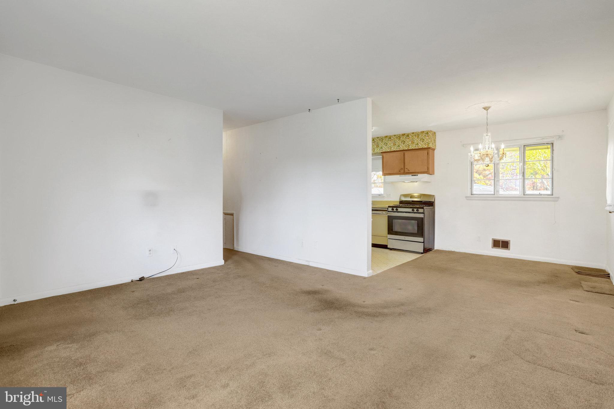 6928 Ruskin Street Springfield, VA 22150 - Photo 5 of 34 a view of an empty room with a window