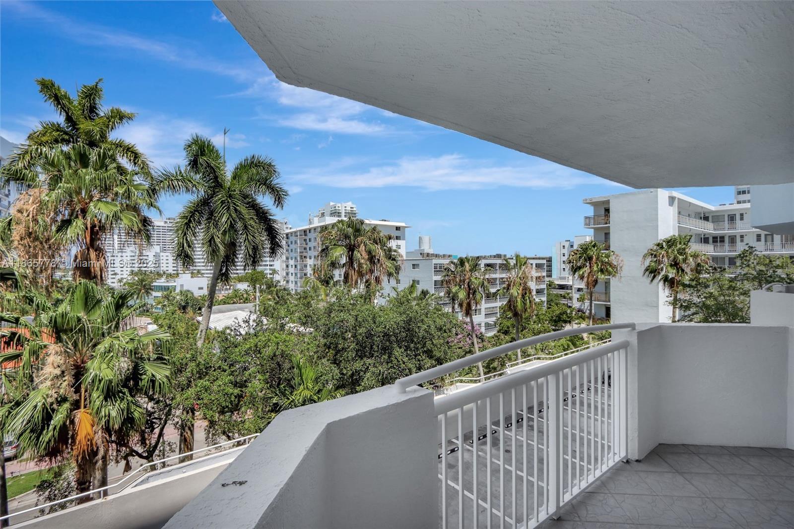 1621 Bay Road, Unit 506 Miami Beach, FL 33139 - Photo 3 of 26 a view of balcony with small garden