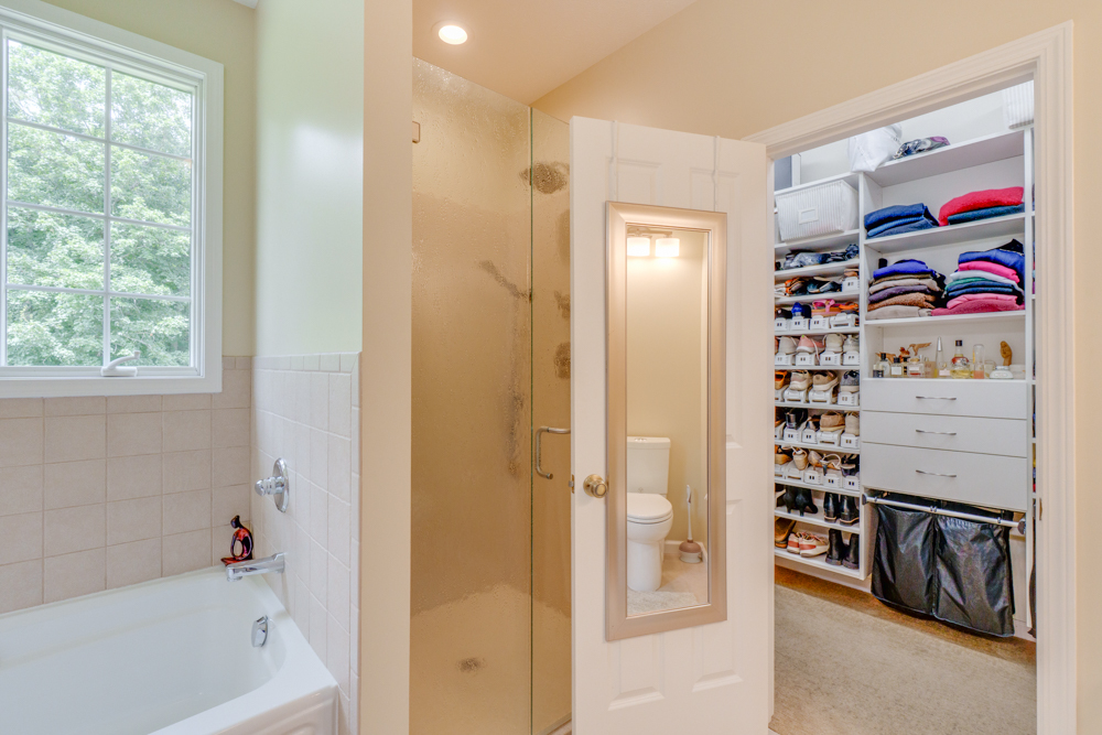 3550 East Bishop Road Mount Vernon, IL 62864 - Photo 32 of 61 a view of walk in closet with clothes and shoes