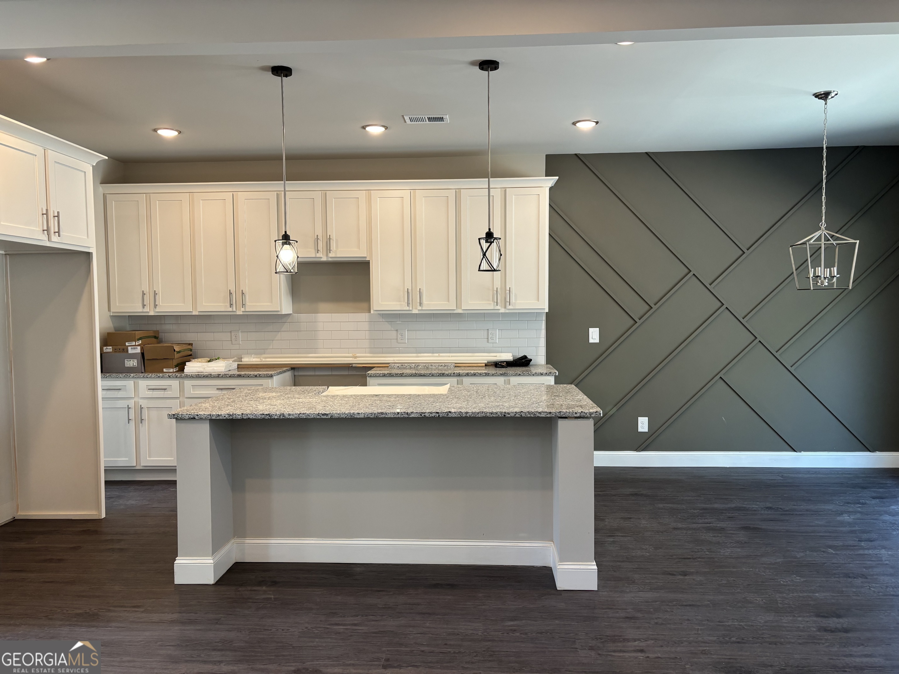 16 Hadrian Ridge Drive Southwest Rome, GA 30165 - Photo 16 of 25 a kitchen with a sink cabinets and wooden floor