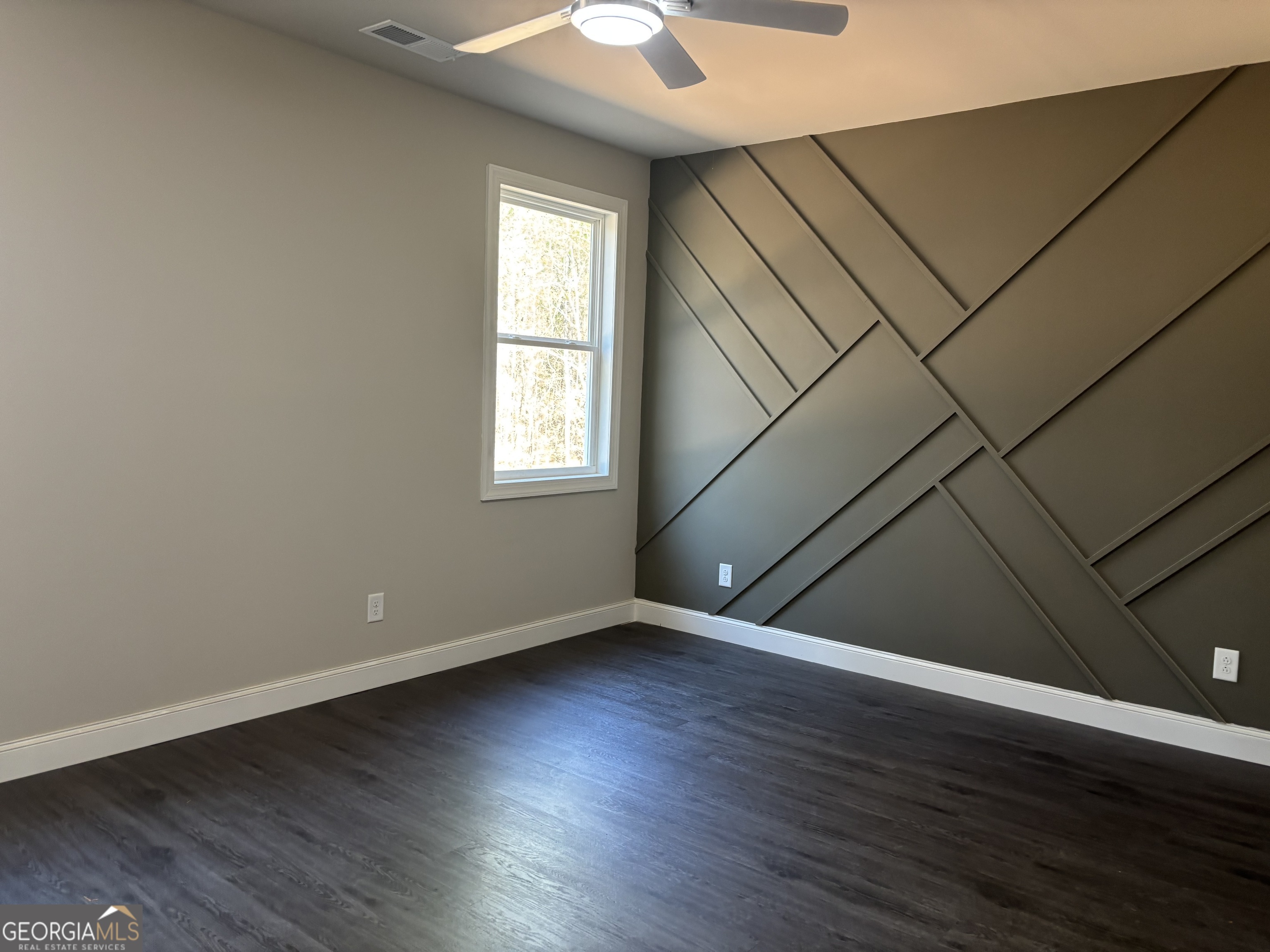 16 Hadrian Ridge Drive Southwest Rome, GA 30165 - Photo 20 of 25 an empty room with wooden floor and windows
