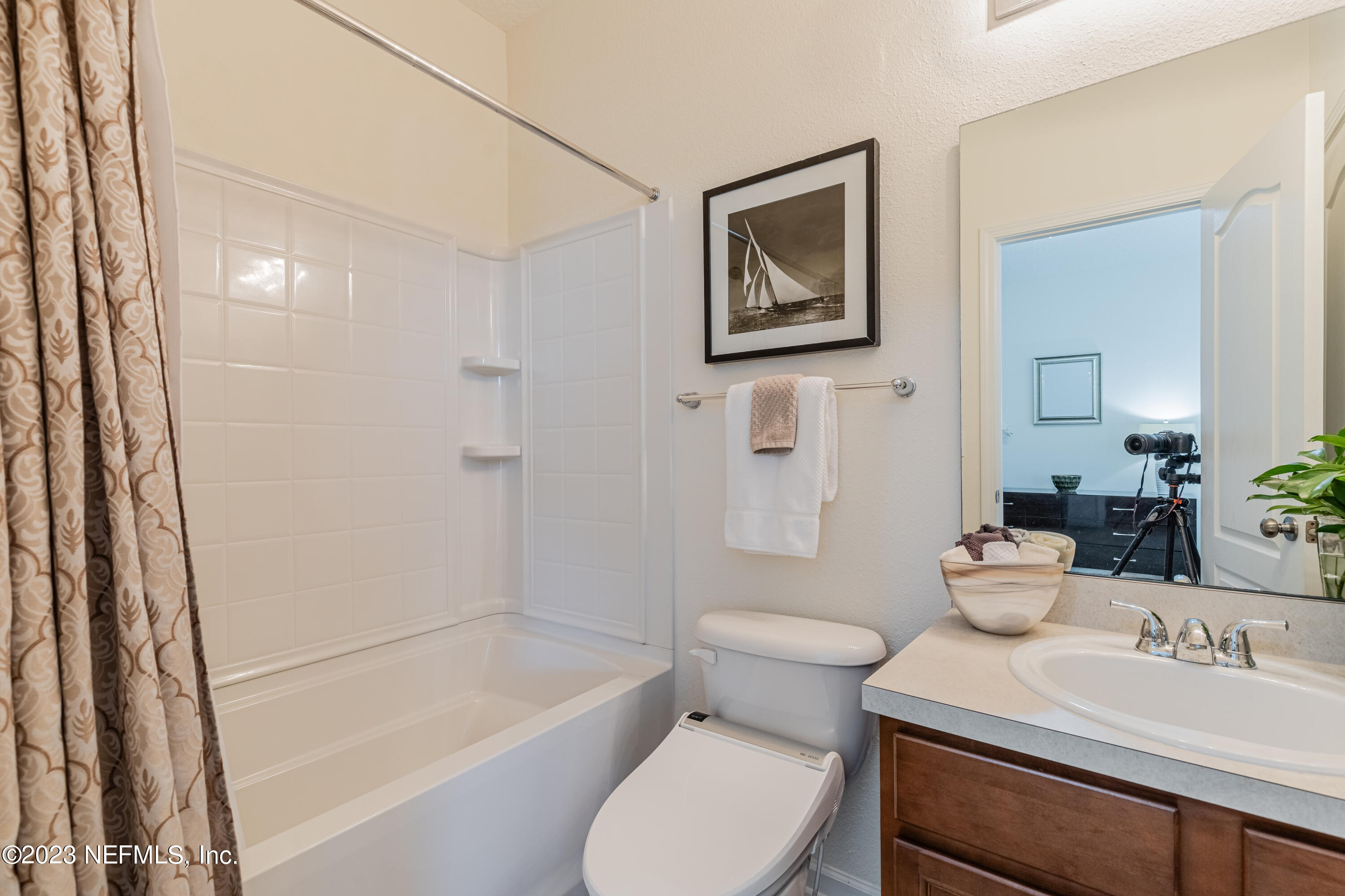 800 Eagle Cove Drive Fleming Island, FL 32003 - Photo 20 of 99 a bathroom with a sink toilet and shower