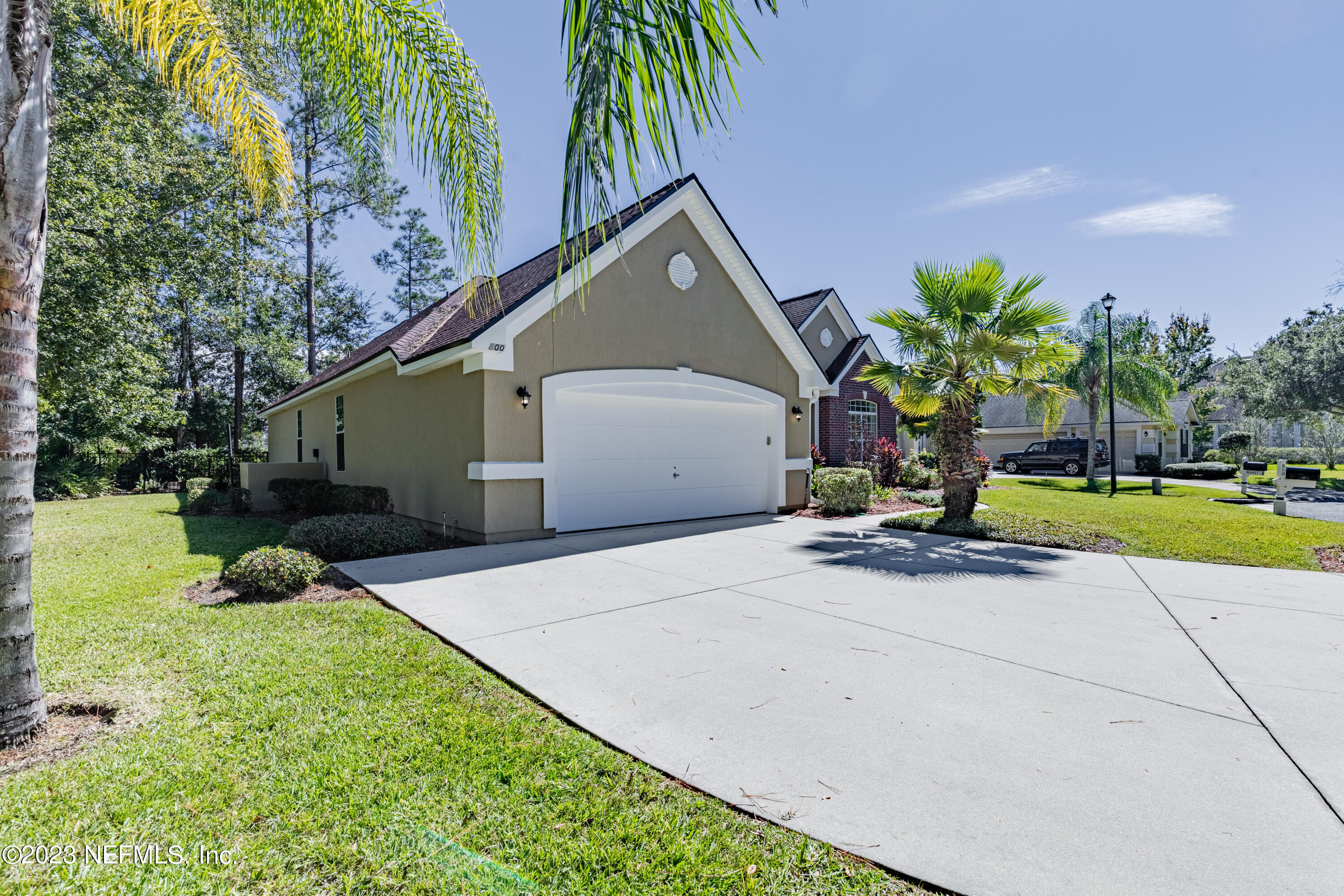 800 Eagle Cove Drive Fleming Island, FL 32003 - Photo 36 of 99 a house view with a garden space