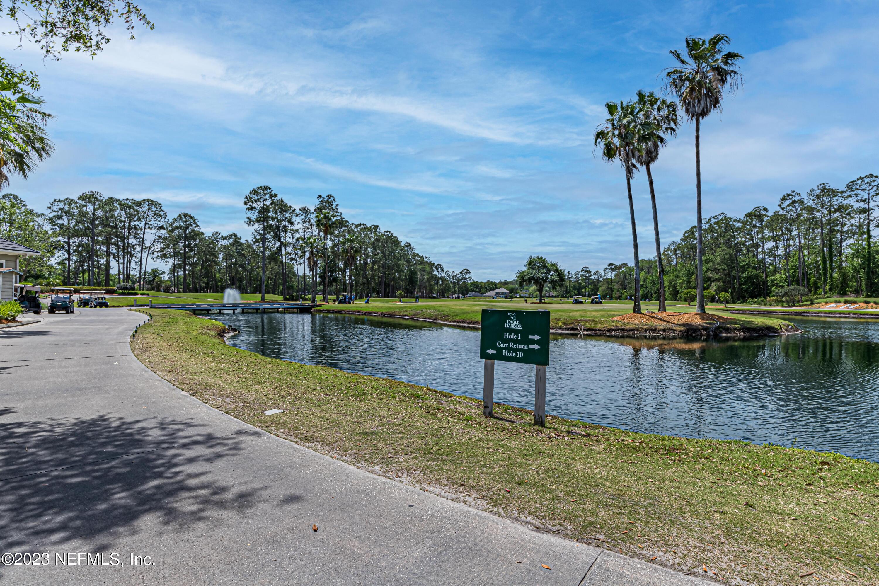 800 Eagle Cove Drive Fleming Island, FL 32003 - Photo 60 of 99 a view of a lake with trees