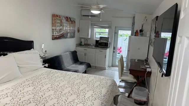 a bathroom with a sink toilet and mirror
