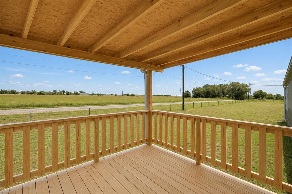 1206 Hayes Road Sherman, TX 75090 - Photo 3 of 21 a view of wooden floor with a lake