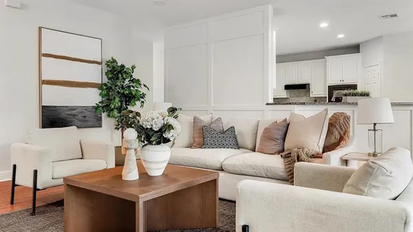 a bedroom with a bed and ceiling fan