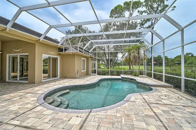 a view of a house with a swimming pool