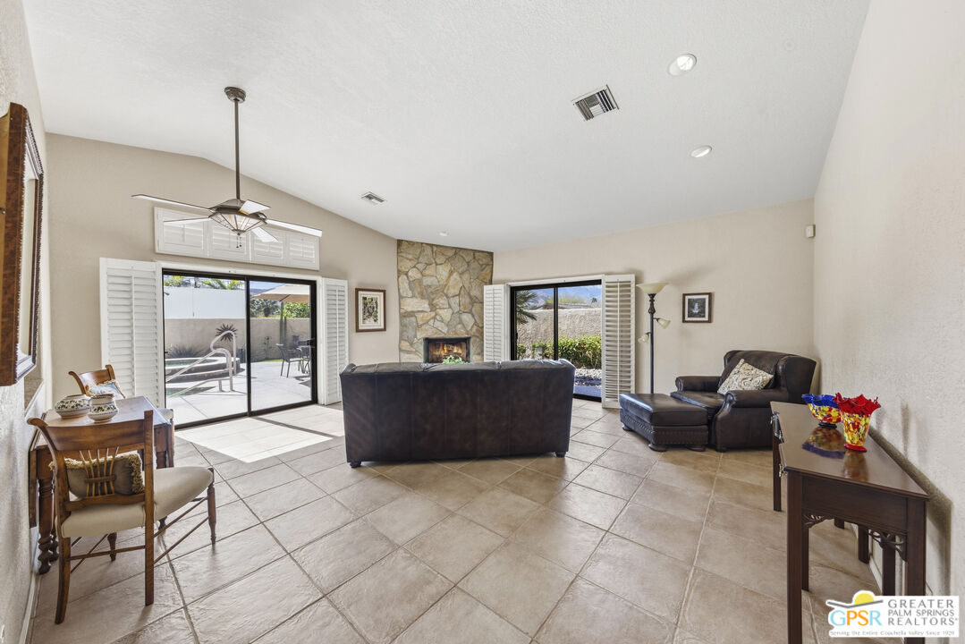 35127 Plumley Road Cathedral City, CA 92234 - Photo 10 of 32 a living room with furniture and a window