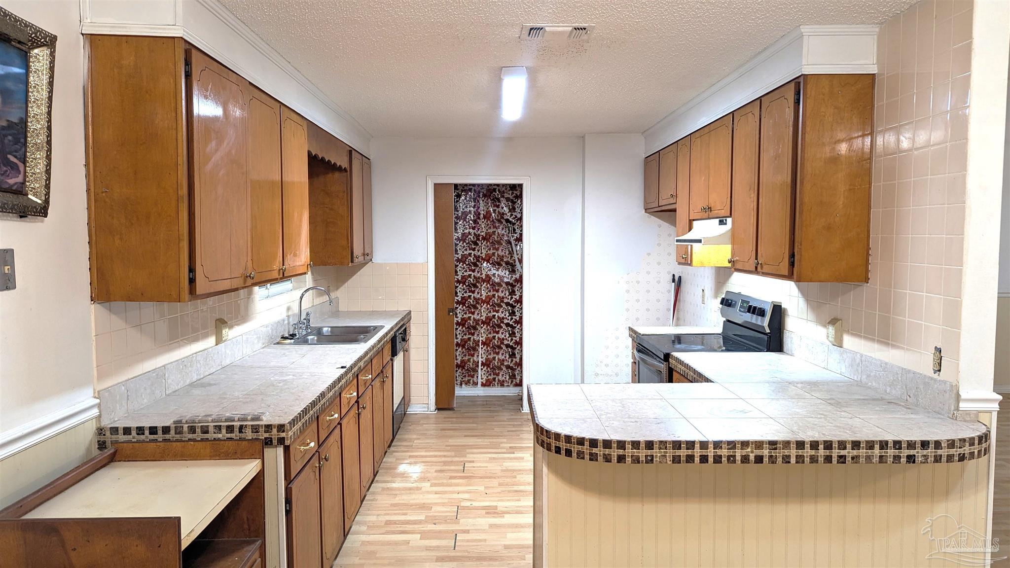 4312 Indiana Circle Pace, FL 32571 - Photo 5 of 21 Galley Kitchen with Pantry