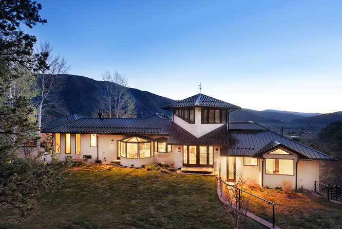 571 Booth Lane Basalt, CO 81621 - Photo 11 of 58 a front view of a house with a large window