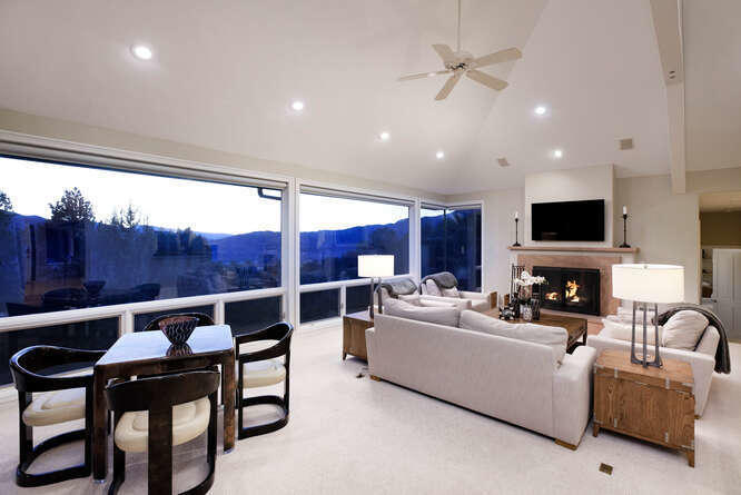 571 Booth Lane Basalt, CO 81621 - Photo 16 of 58 a living room with furniture a fireplace and a flat screen tv