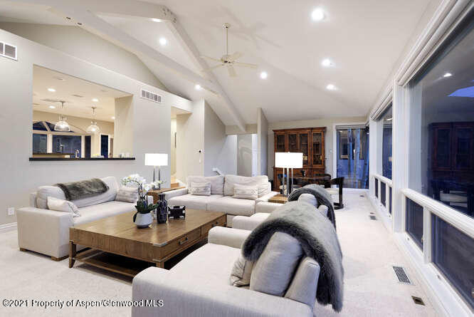 571 Booth Lane Basalt, CO 81621 - Photo 17 of 58 a living room with furniture and a flat screen tv