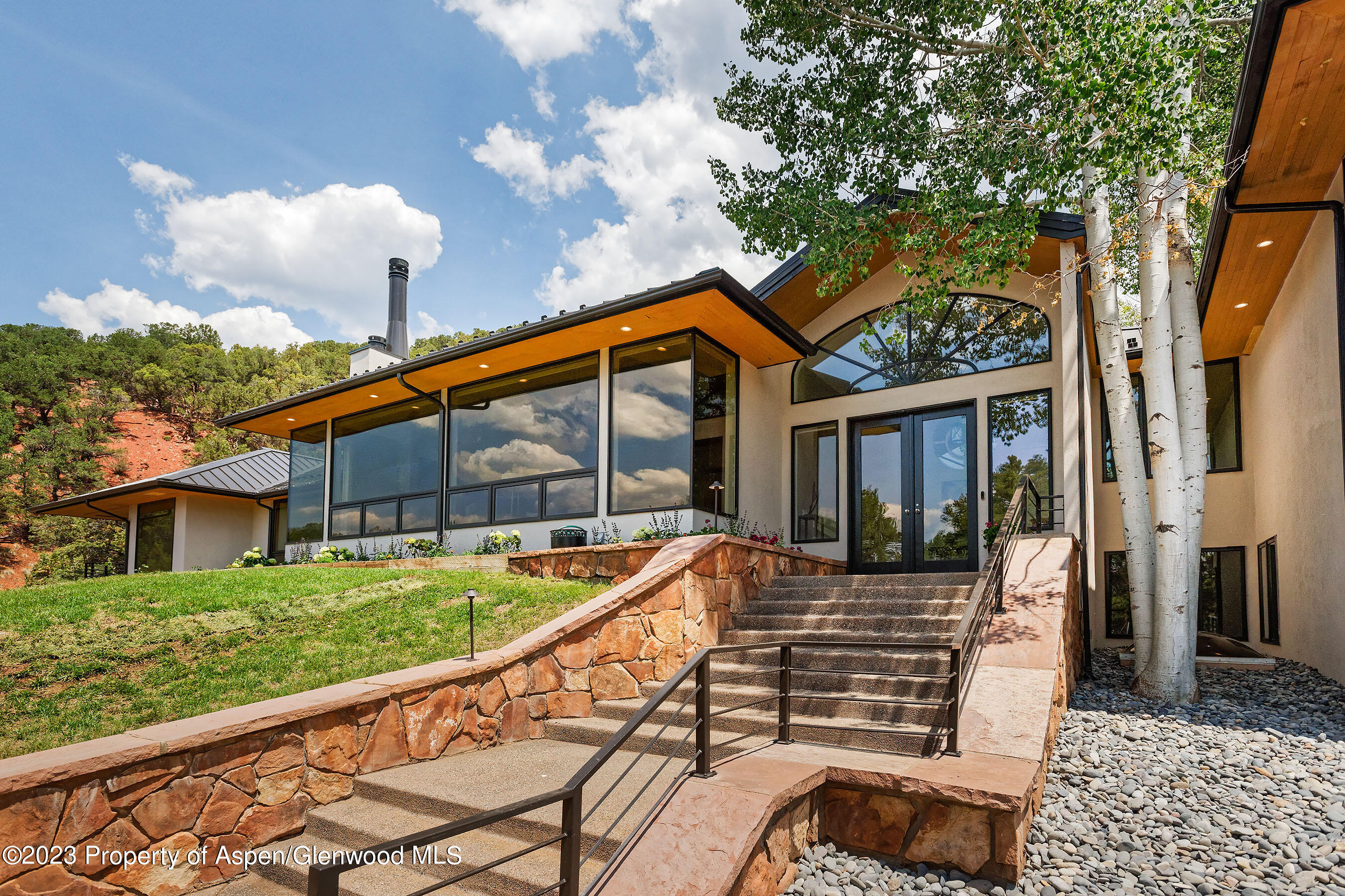 571 Booth Lane Basalt, CO 81621 - Photo 3 of 58 a view of an house with backyard and porch