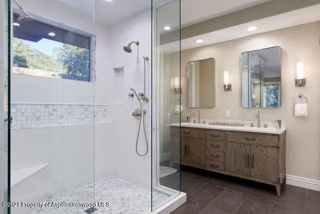 a work room with furniture and a fireplace