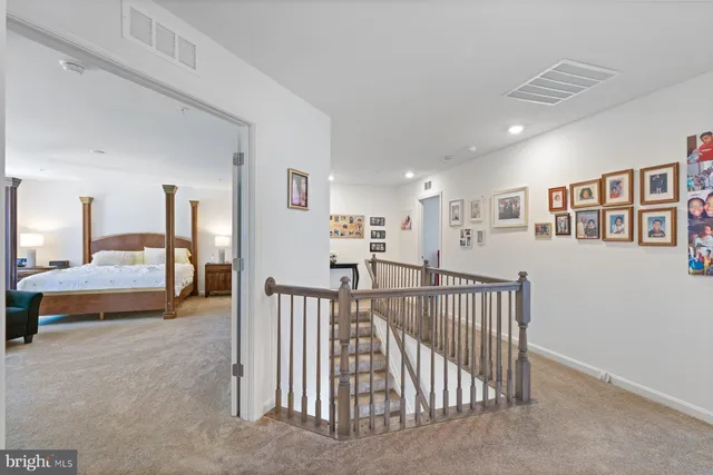 a view of hallway with livingroom