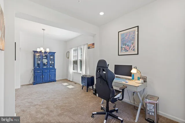 a workspace with furniture and window