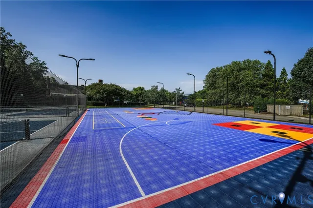 a view of swimming pool with a patio