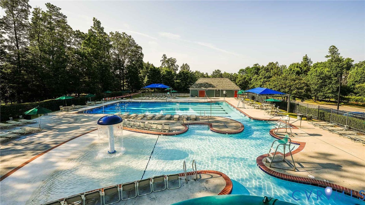 1042 Arbor Heights Terrace Midlothian, VA 23114 - Photo 34 of 35 a view of swimming pool with lounge chairs