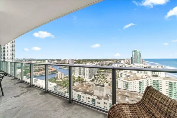 a view of a city with ocean