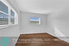 7605 Northwest 5th Place, Unit 101 Margate, FL 33063 - Photo 7 of 14 a view of a bedroom