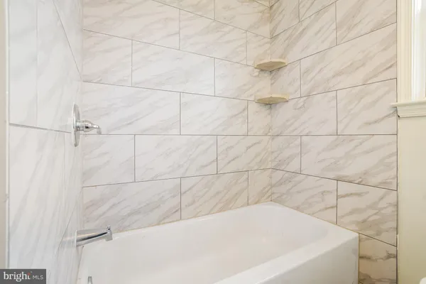 a bathroom with a bathtub