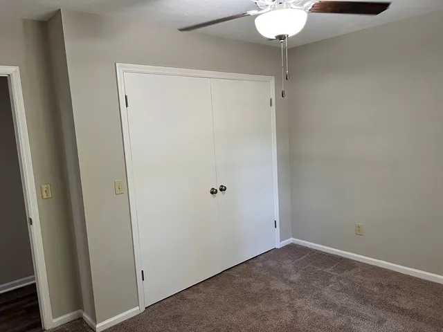 a view of a small space with a refrigerator