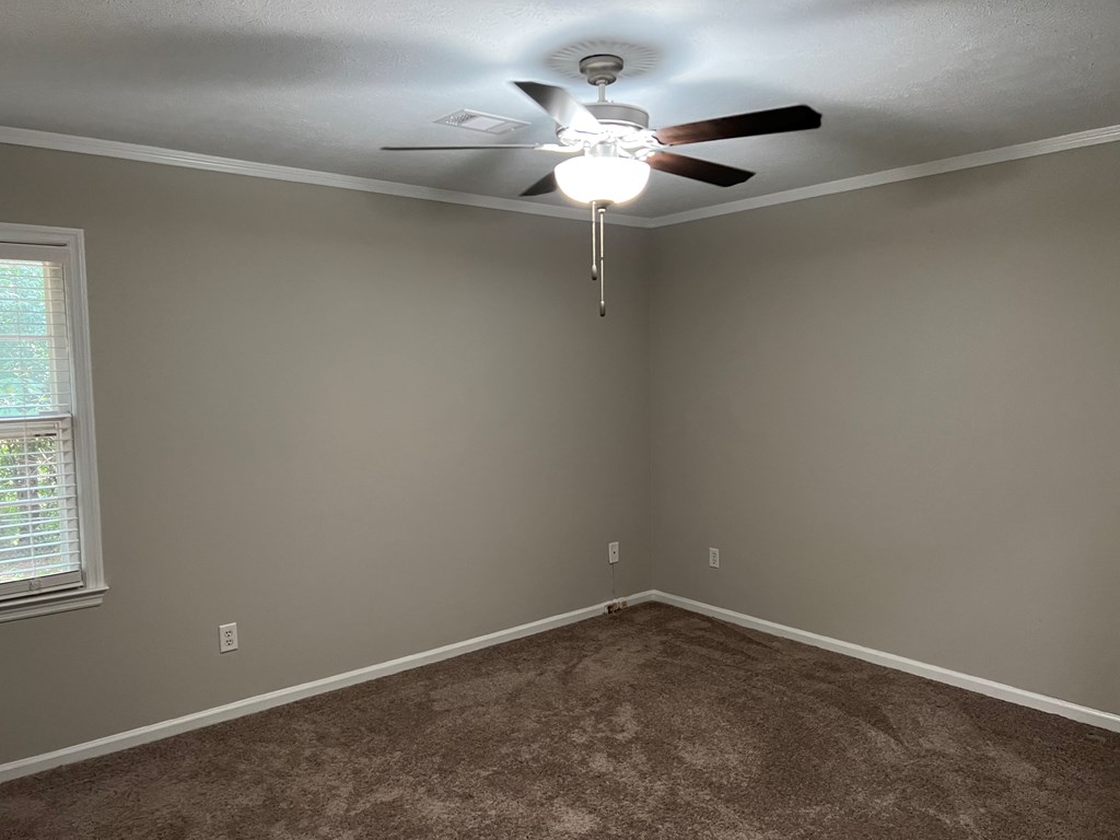 4456 Ritch Haven Road Columbus, GA 31909 - Photo 9 of 14 an empty room with a window