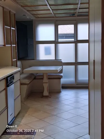 a room with furniture and window