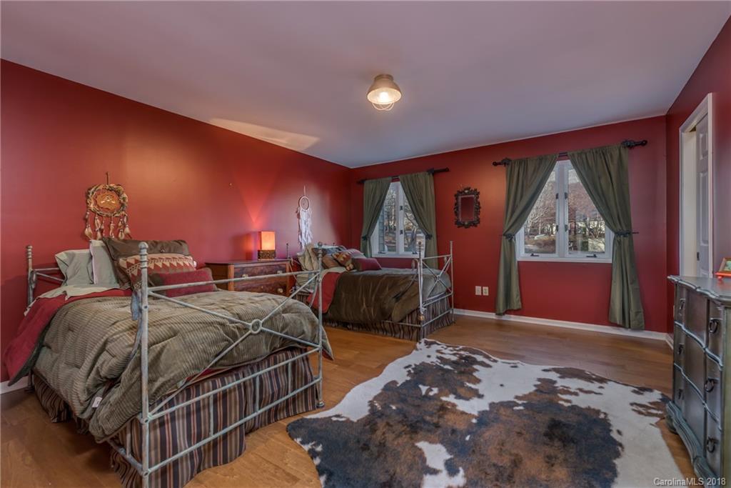 29 Hunting Country Trail Tryon, NC 28782 - Photo 15 of 20 a bedroom with double bed and a window