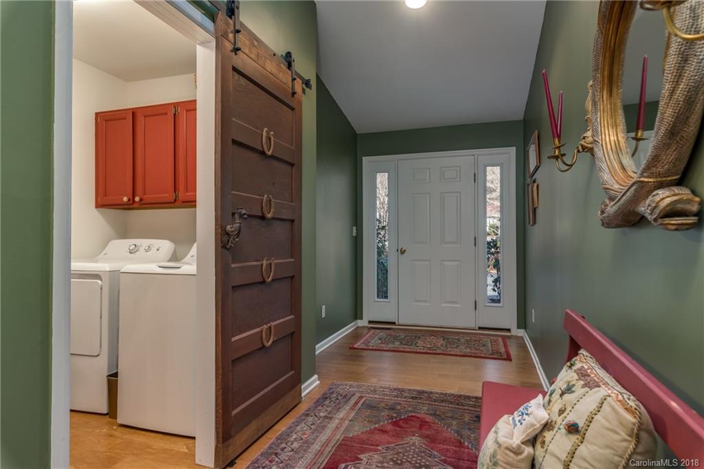 29 Hunting Country Trail Tryon, NC 28782 - Photo 3 of 20 a bathroom with a sink and a shower