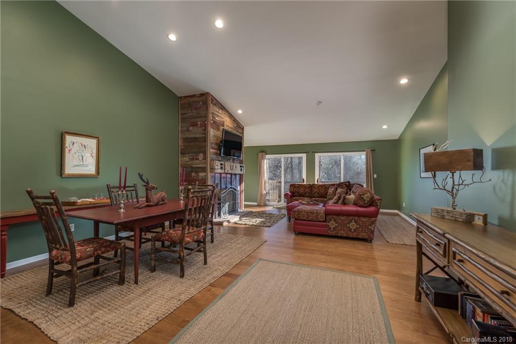 29 Hunting Country Trail Tryon, NC 28782 - Photo 4 of 20 a living room with furniture a piano and a table