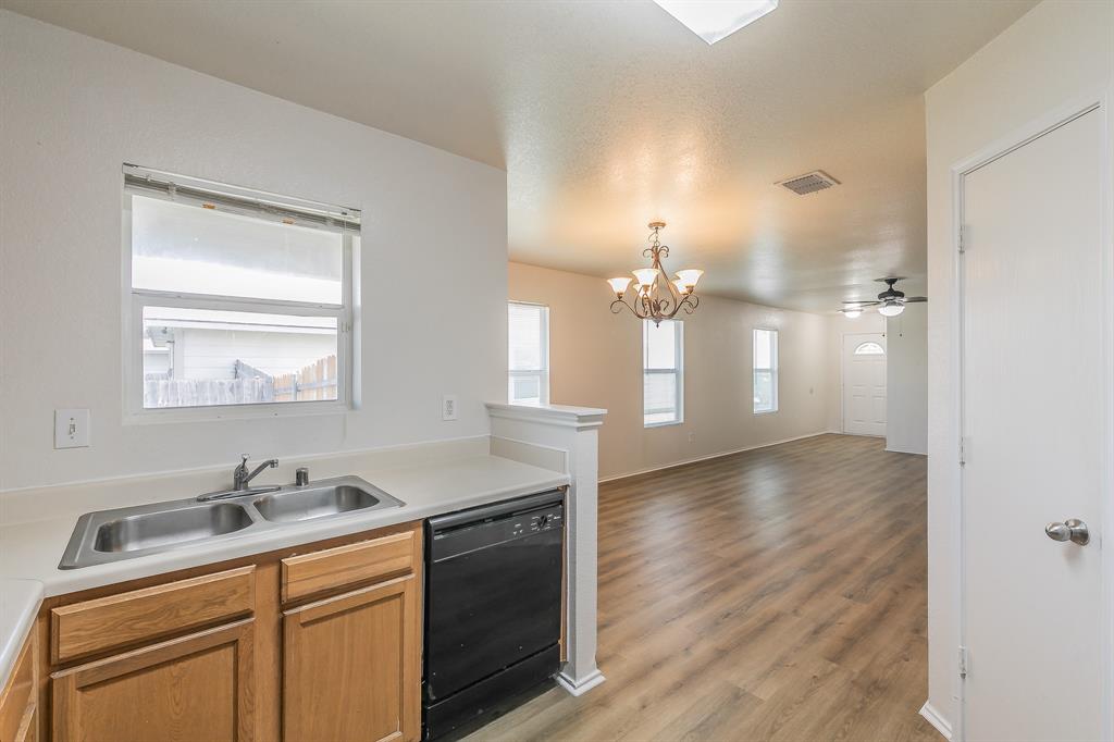 213 Cres Ridge Drive Fort Worth, TX 76140 - Photo 11 of 32 a view of a bathroom sink and mirror