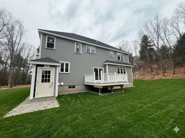 a front view of house with yard