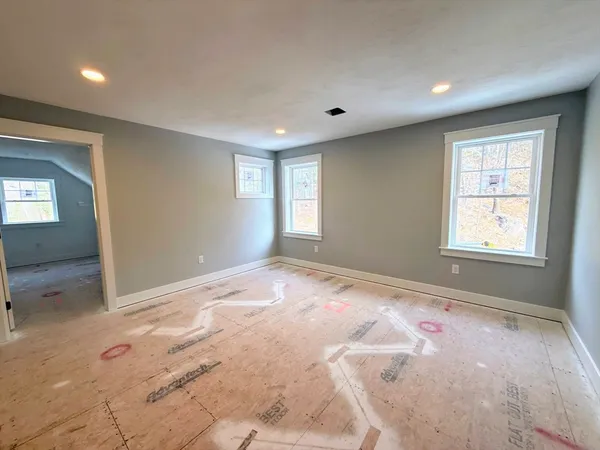 an empty room with windows