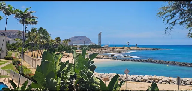 a sign that is sitting in front of a building