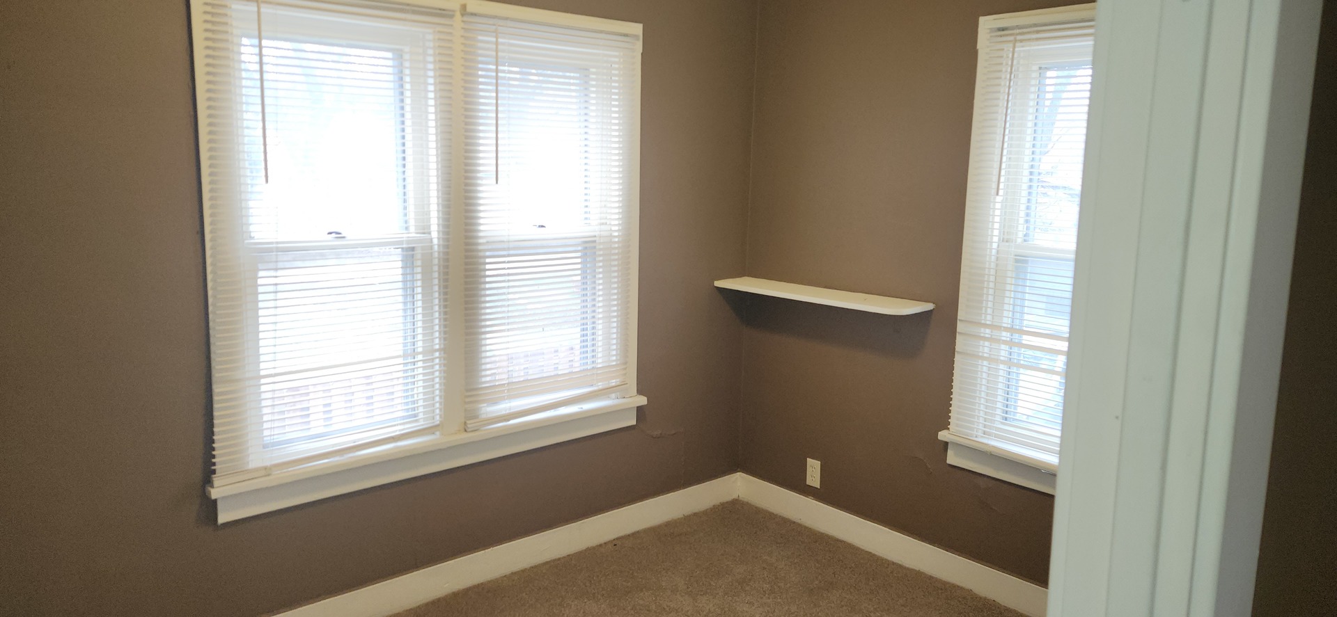 316 Lawrence Avenue Elgin, IL 60123 - Photo 6 of 8 a view of empty room with windows