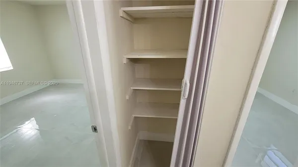 a view of a balcony with a door