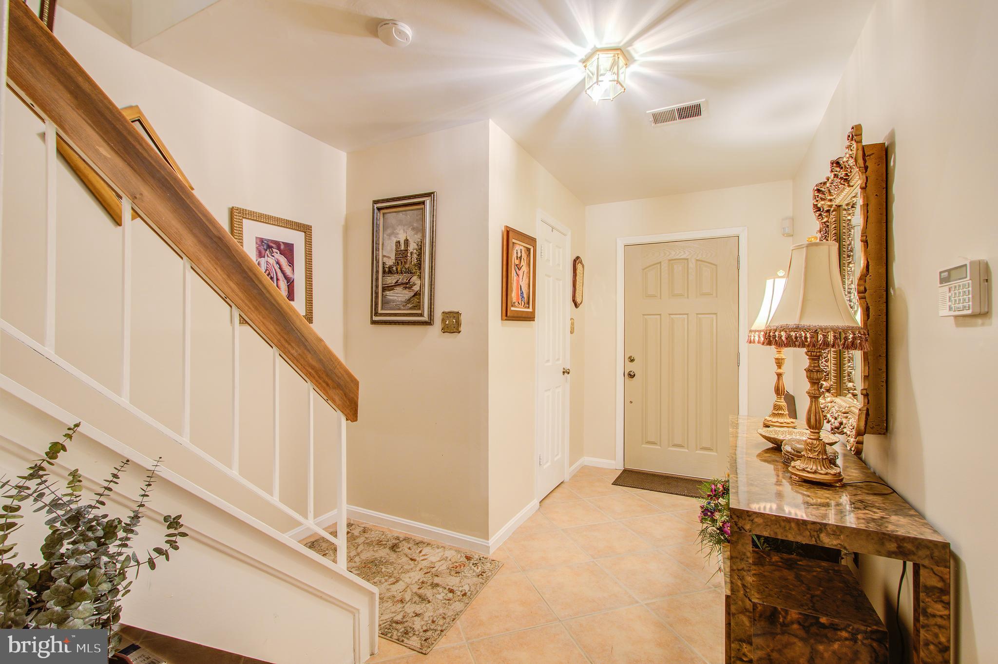 10940 Pebble Run Drive Silver Spring, MD 20902 - Photo 3 of 36 Foyer with tile floor
