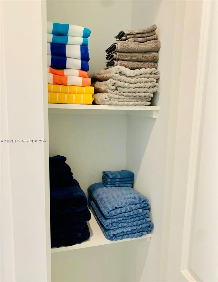 667 Southwest Cleveland Avenue, Unit 3 Stuart, FL 34994 - Photo 26 of 42 a bathroom with a sink and a mirror