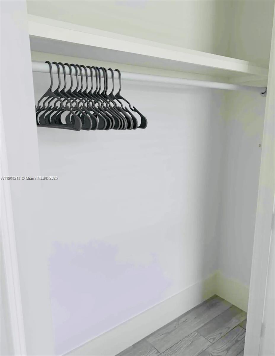 667 Southwest Cleveland Avenue, Unit 3 Stuart, FL 34994 - Photo 27 of 42 a white wall with a window