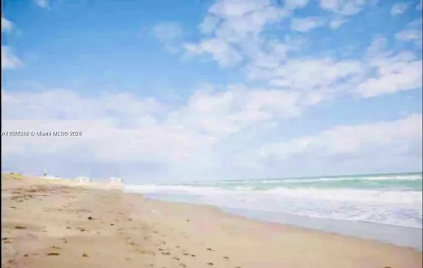 a view of beach and ocean