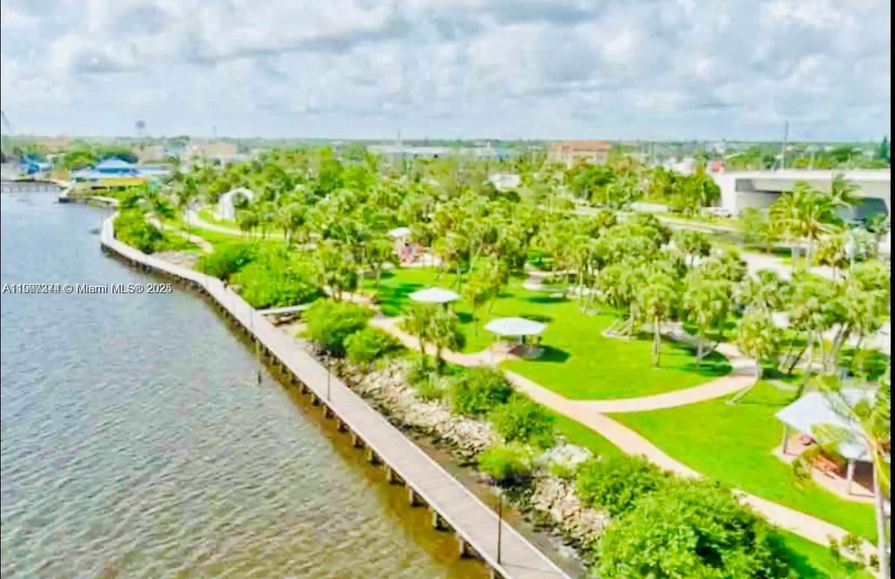 667 Southwest Cleveland Avenue, Unit 3 Stuart, FL 34994 - Photo 40 of 42 a view of swimming pool from a balcony