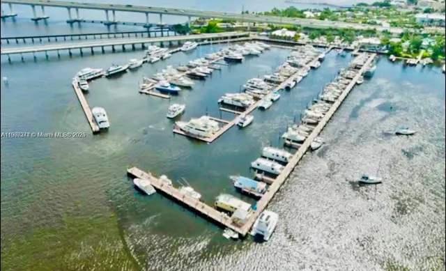 an aerial view of a house with outdoor space