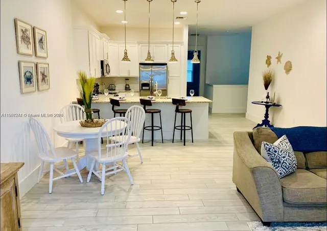 a view of a dining room with furniture