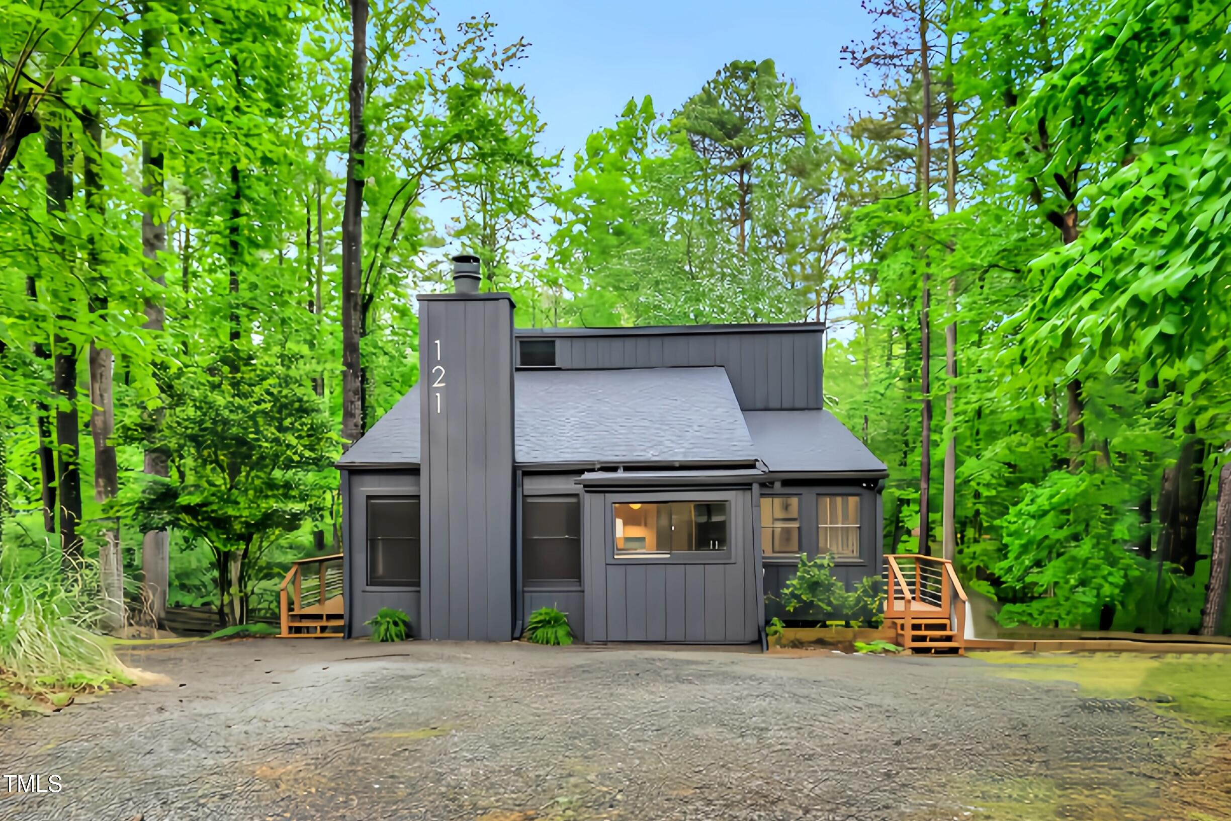 121 Lady Bug Lane Chapel Hill, NC 27516 - Photo 1 of 36 front view of a house with a yard