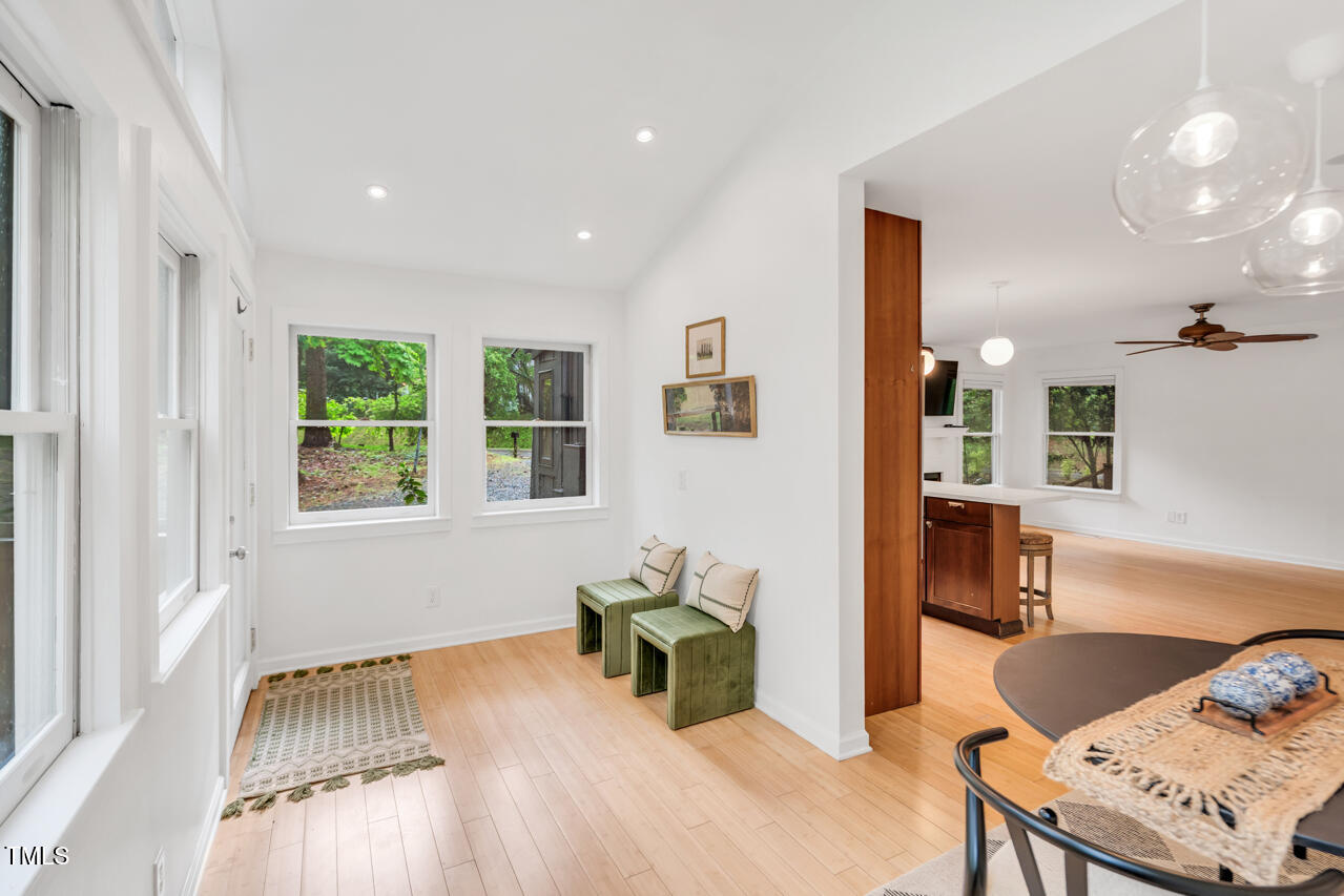 121 Lady Bug Lane Chapel Hill, NC 27516 - Photo 11 of 36 a room with furniture and a wooden floor