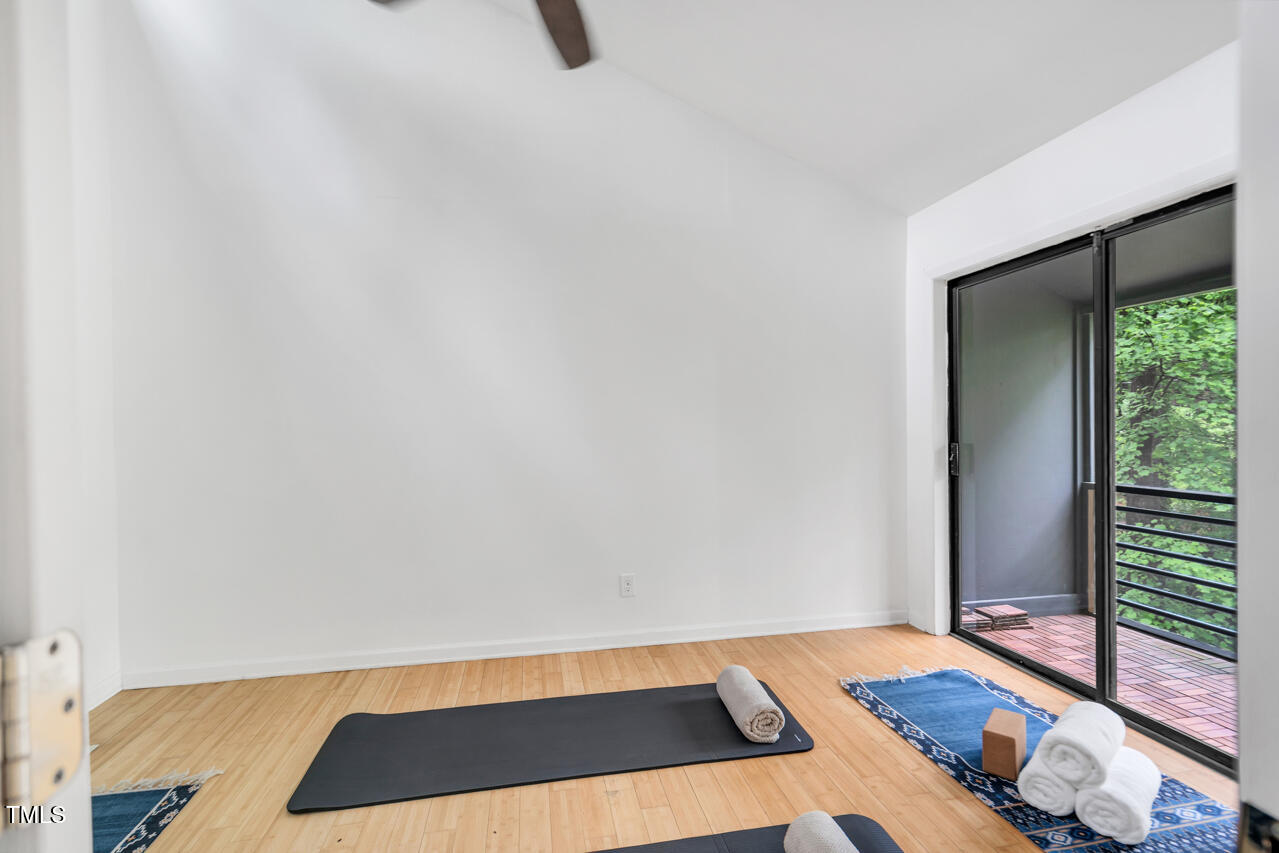 121 Lady Bug Lane Chapel Hill, NC 27516 - Photo 19 of 36 a view of an empty room and wooden floor
