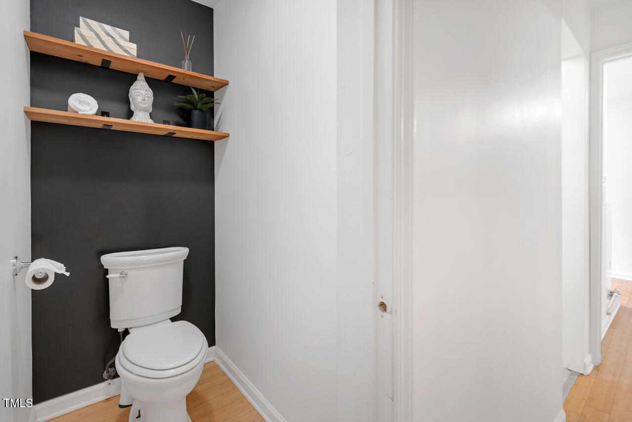 121 Lady Bug Lane Chapel Hill, NC 27516 - Photo 23 of 36 a bathroom with a toilet and a sink
