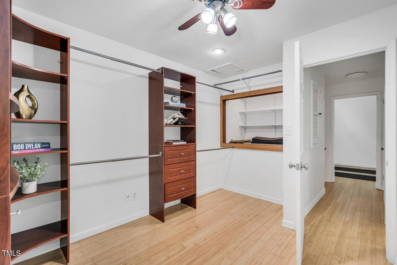 121 Lady Bug Lane Chapel Hill, NC 27516 - Photo 28 of 36 a view of a hallway with wooden floor and a refrigerator